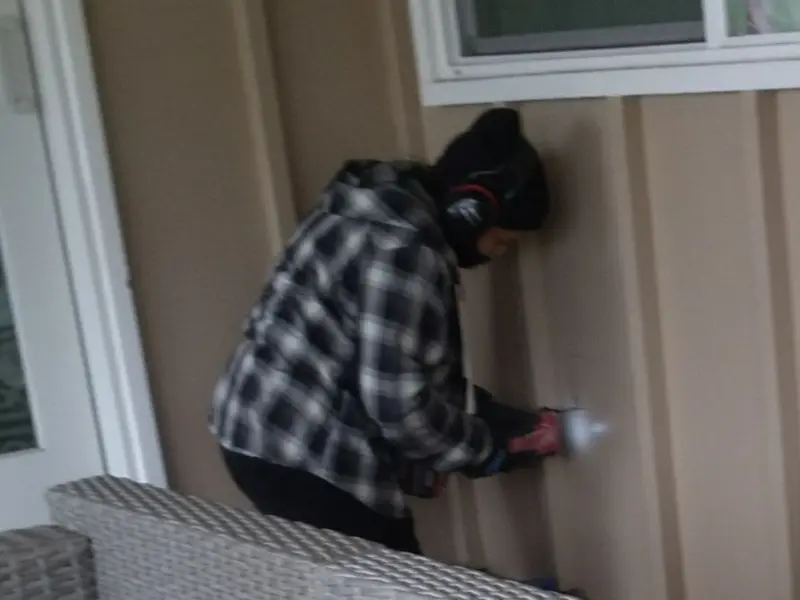 Professional electrician installing an exterior outlet in Calipatria